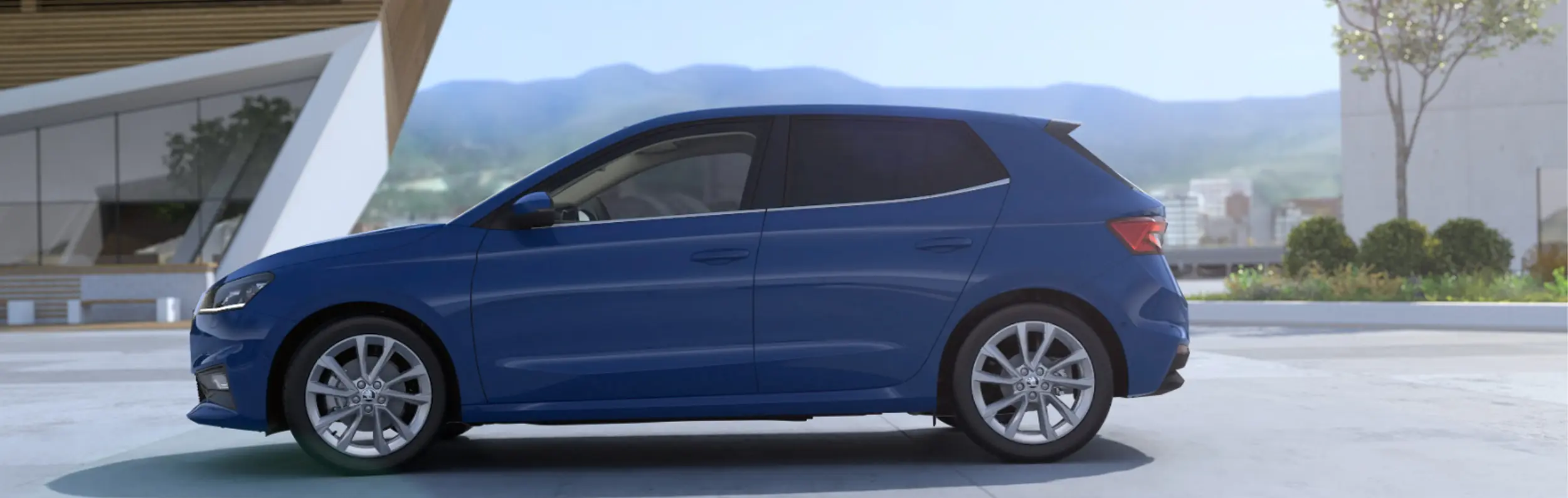 zu sehen ist ein blauer Skoda Fabia von der Seite